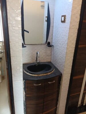 Bathroom in 2 BHK Apartment at Leo Chankaya, Kandivali West – for Sale