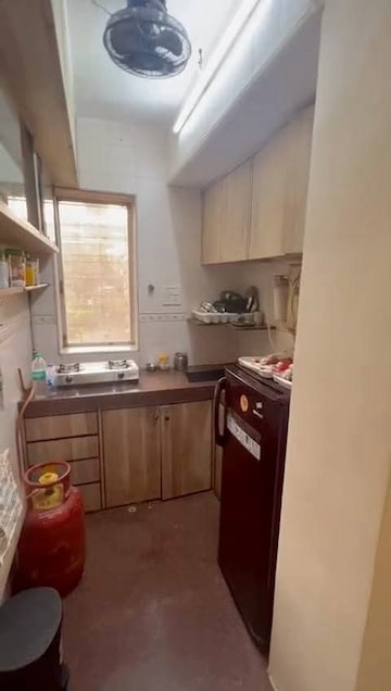 Kitchen in 1.5 BHK Apartment at New Sarvottam CHS Vile Parle West, Vile Parle West – for Rent