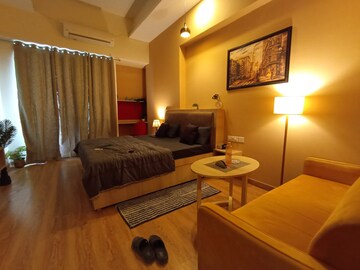 Living Room in Studio Apartment at Gaur City Mall, Sector 4, Greater Noida – for Rent