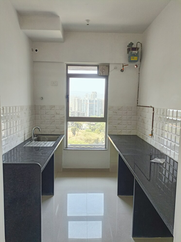 Kitchen, kalpataru-immensa 2 Bedroom 600 Sq.Ft. Apartment In Kolshet Road Thane 8490706