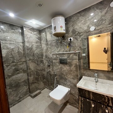 Bathroom in 4 BHK Builder Floor at Chattarpur – for Sale