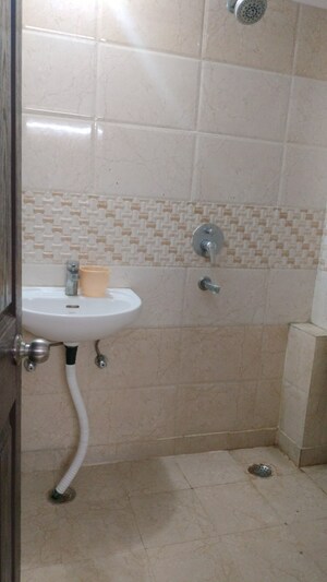 Bathroom in 2 BHK Apartment at Devika Skypers, Raj Nagar Extension – for Sale
