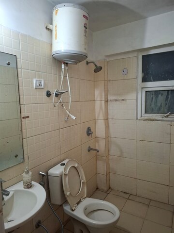Bathroom in 3 BHK Apartment at Tulip Petals, Sector 89 – for Rent