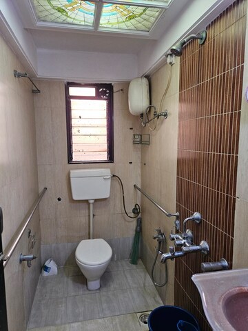 Bathroom in 2.5 BHK Apartment at Balaji Garden CHS, Kopar Khairane – for Rent