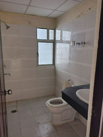 Bathroom in 2 BHK Apartment at KDP Grand Savanna, Raj Nagar Extension – for Rent