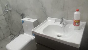 Bathroom in 2 BHK Apartment at Mahavir Enclave – for Sale