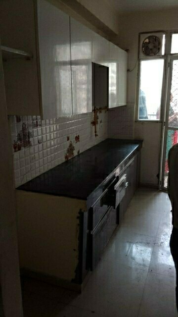 Kitchen in 2 BHK Apartment at Ajnara Integrity, Raj Nagar Extension – for Rent