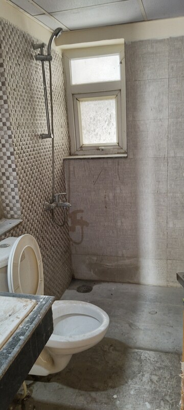 Bathroom in 3 BHK Apartment at Shri Radha Sky Gardens, Sector 16b Greater Noida – for Rent