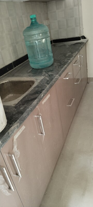 Kitchen in 3 BHK Apartment at Shri Radha Sky Gardens, Sector 16b Greater Noida – for Rent