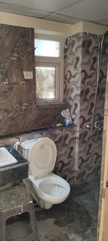 Bathroom in 3 BHK Apartment at Shri Radha Sky Gardens, Sector 16b Greater Noida – for Rent