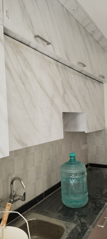 Bathroom in 3 BHK Apartment at Shri Radha Sky Gardens, Sector 16b Greater Noida – for Rent