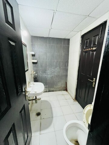 Bathroom in 3 BHK Apartment at Proview Officer City 2, Raj Nagar Extension – for Rent