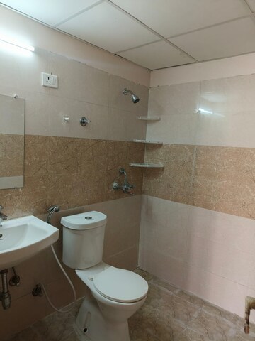 Bathroom in 2.5 BHK Apartment at Amrapali Golf Homes, Sector 4, Greater Noida – for Rent