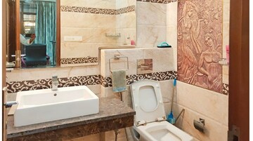 Bathroom in 4 BHK Builder Floor at Sector 46 – for Rent
