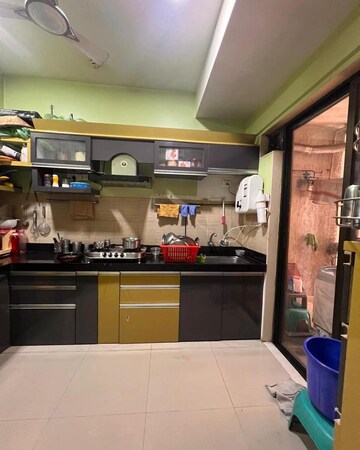 Kitchen in 2 BHK Apartment at Lodha Luxuria, Majiwada – for Rent