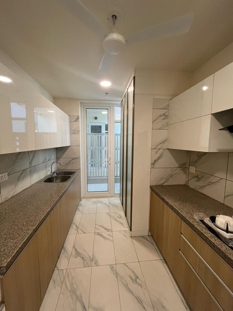 Kitchen, emaar-the-palm-drive-palm-studios 4 Bedroom 2100 Sq.Ft. Apartment In Sector 66 Gurgaon 8491825