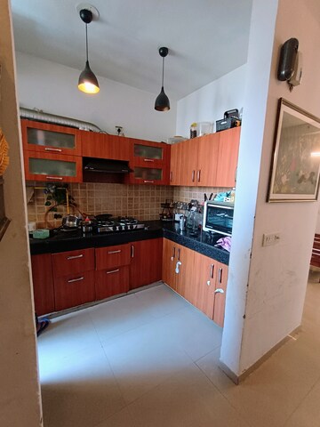 Kitchen in 3 BHK Apartment at Mahagun Mywoods II, Sector 16c Greater Noida – for Rent