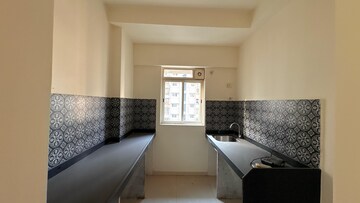 Kitchen in 1 BHK Apartment at Lodha Amara, Kolshet Road – for Rent