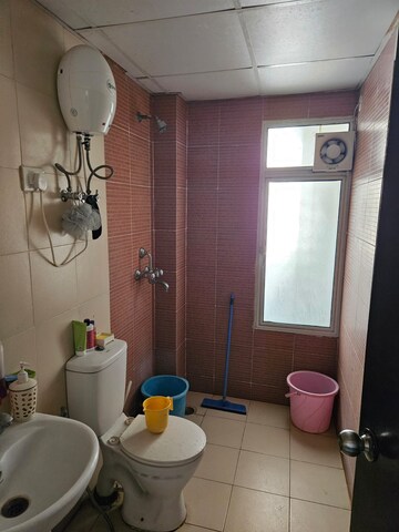 Bathroom in 3 BHK Apartment at Mahagun Mywoods, Sector 16c Greater Noida – for Rent