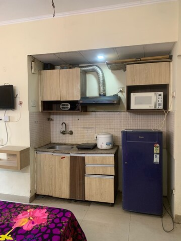 Kitchen in Studio Apartment at Supertech Ecociti, Sector 137 – for Rent