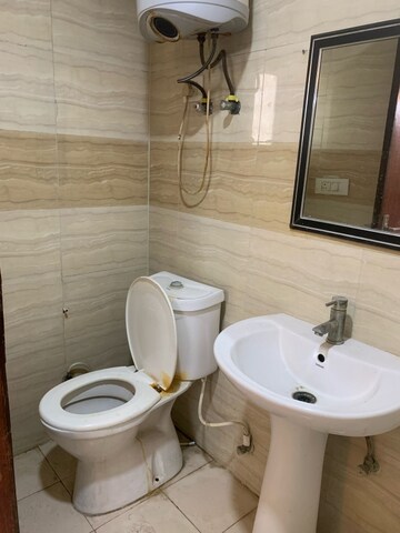 Bathroom in Studio Apartment at Supertech Ecociti, Sector 137 – for Rent