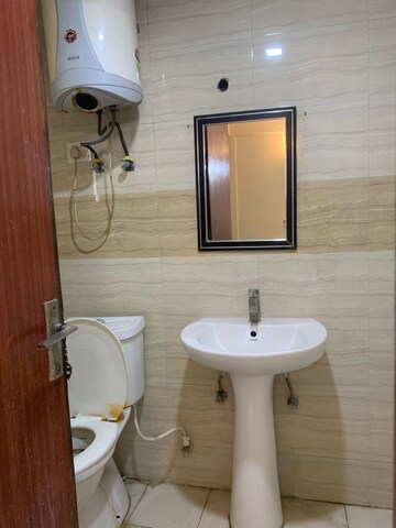 Bathroom in Studio Apartment at Supertech Ecociti, Sector 137 – for Rent
