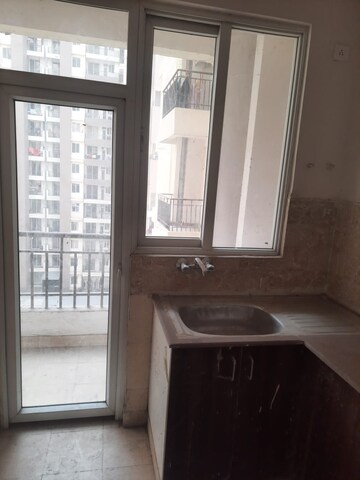 Building Lobby in 2 BHK Apartment at Amrapali Golf Homes, Sector 4, Greater Noida – for Sale