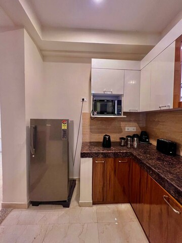 Kitchen in 3 BHK Apartment at Omaxe The Palace, Gomti Nagar – for Rent