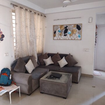 Living Room in 2.5 BHK Apartment at Nirala Aspire, Panchsheel Green – for Sale