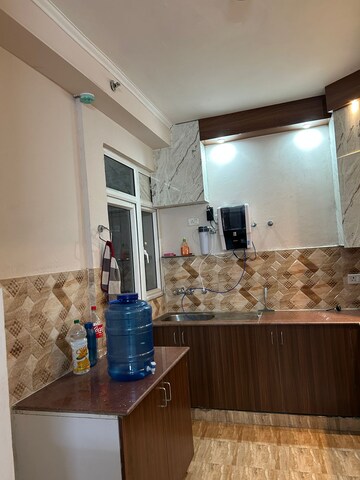 Kitchen in 3 BHK Apartment at Amrapali Golf Homes, Sector 4, Greater Noida – for Rent
