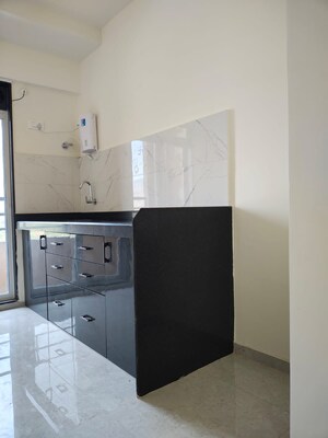 Kitchen in 2 BHK Apartment at DSS Mahavir Kalpavruksha Alcacia Tower, Ghodbunder Road – for Sale