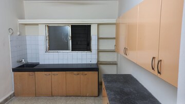 Kitchen in 2 BHK Apartment at Rachna Garden Estate, Aundh – for Rent
