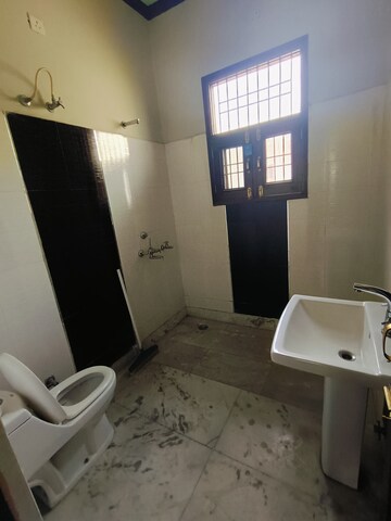 Bathroom in 2 BHK Apartment at Sunny Enclave – for Rent