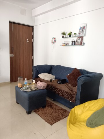 Living Room in 2 BHK Apartment at Lodha Palava Downtown Dombivli East, Dombivli East – for Rent
