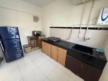 Kitchen in 2 BHK Apartment at Karia Konark Campus, Viman Nagar – for Rent