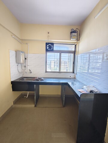 Kitchen in 1 BHK Apartment at Panchamrut Society – for Sale