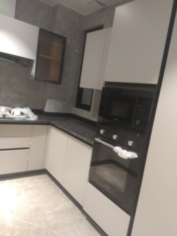 Kitchen in 4 BHK Builder Floor at New Friends Colony – for Rent