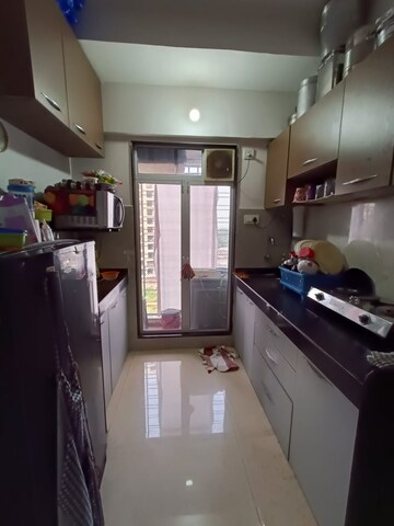 Kitchen in 1 BHK Apartment at RNA NG Ocean Pearl, Mira Road – for Rent