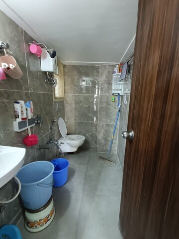 Bathroom in 1 BHK Apartment at RNA NG Ocean Pearl, Mira Road – for Rent