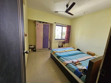 Bedroom in 2 BHK Apartment at Panchamrut Society – for Sale