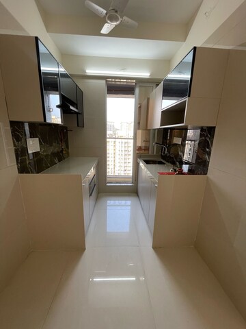Kitchen in 2 BHK Apartment at Unique Ivana, Mira Road – for Sale