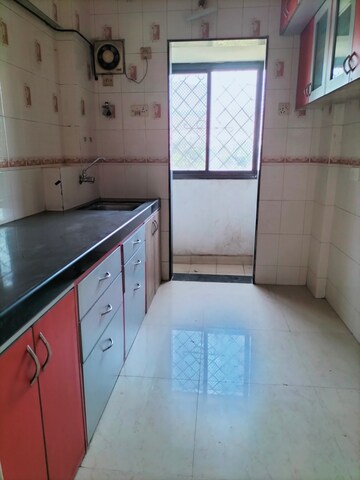 Kitchen in 1 BHK Apartment at Satellite Garden, Goregaon East – for Rent