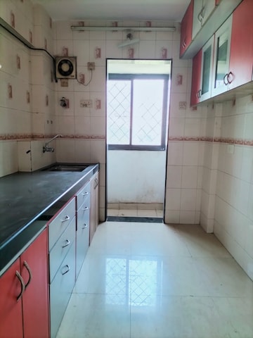 Kitchen in 1 BHK Apartment at Satellite Garden, Goregaon East – for Rent