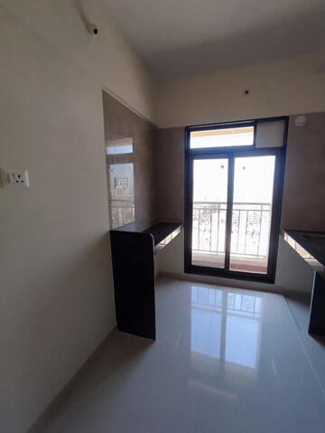 Kitchen in 1 BHK Apartment at KM Horizon Exotica, Haware City – for Rent