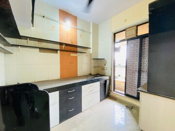 Kitchen in 1 BHK Apartment at Om Sai Residency Dombivali, Dombivli East – for Sale