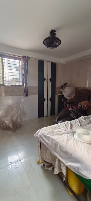 Bedroom in 3 BHK Apartment at Sangam Charkop Akash Kiran CHS, Charkop Sector 2 – for Sale