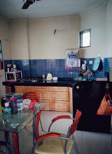 Kitchen in 2 BHK Apartment at Manikchand Malabar, Lulla Nagar – for Rent