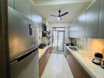 Kitchen in 3 BHK Apartment at Piramal Vaikunth, Balkum Pada – for Rent