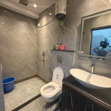 Bathroom in 3 BHK Builder Floor at Kalkaji – for Rent