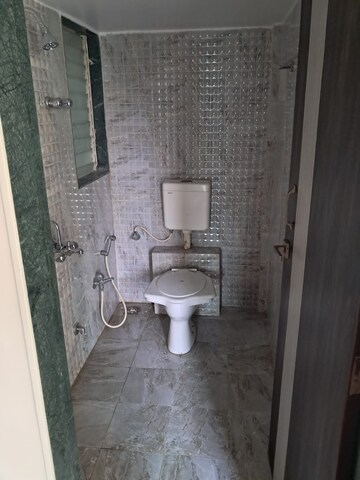 Bathroom in 2 BHK Apartment at Mohan Willows, Badlapur East – for Rent